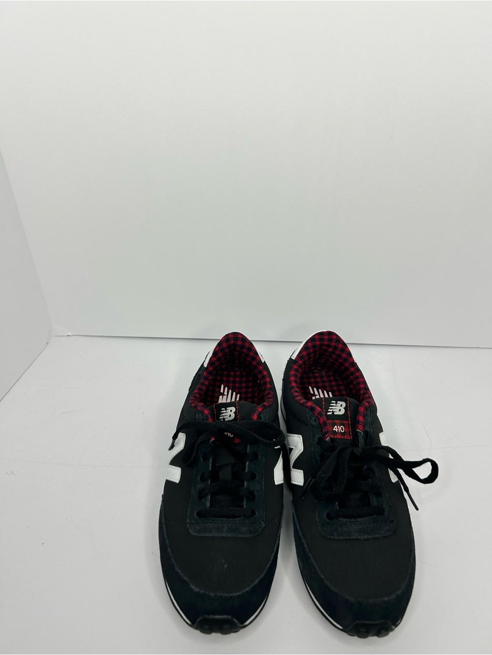 New Balance Women’s Black Sneakers with Red Plaid Lining